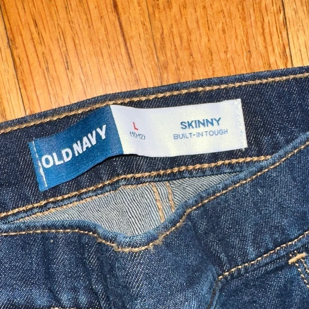 Old Navy girls pull on Slim Jeans in Light and Dark Blue